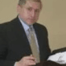 Michael Manoussos, Esq.